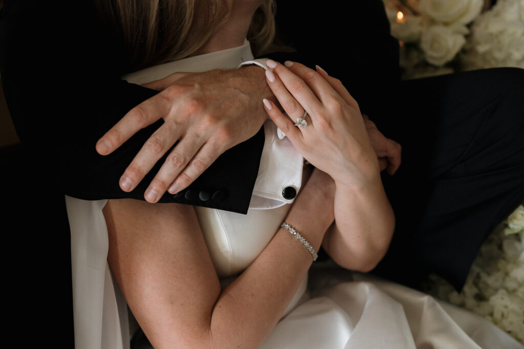 A bride and groom, take couples portraits in their modern aesthetic home at their private wedding ceremony.Timeless indoor wedding in Dallas, captured with a refined, editorial approach by DFW documentary wedding photographer.