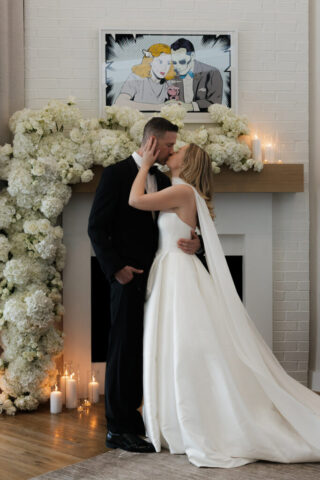 A bride and groom, take couples portraits in their modern aesthetic home at their private wedding ceremony.Timeless indoor wedding in Dallas, captured with a refined, editorial approach by DFW documentary wedding photographer.