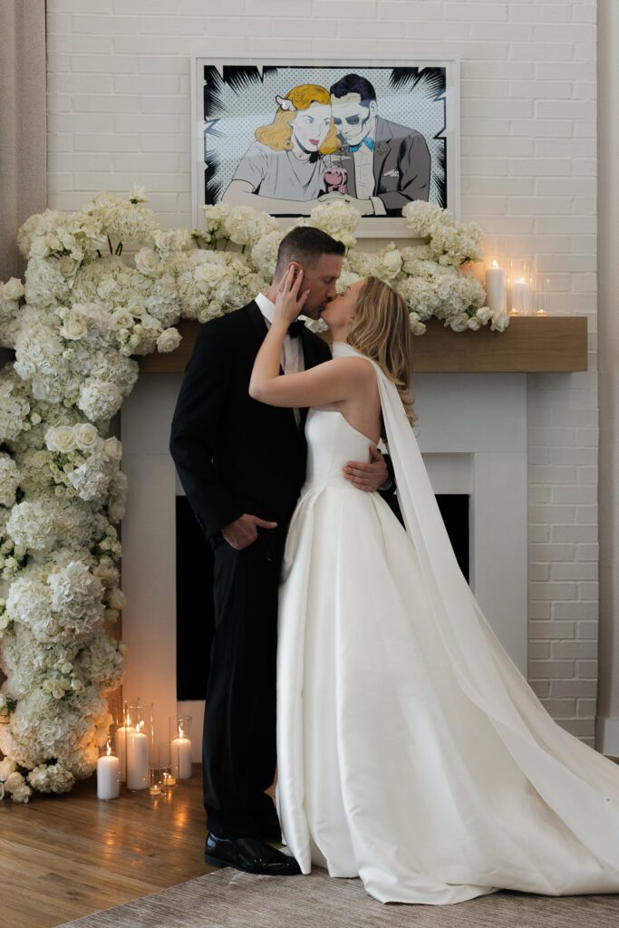 A bride and groom, take couples portraits in their modern aesthetic home at their private wedding ceremony.Timeless indoor wedding in Dallas, captured with a refined, editorial approach by DFW documentary wedding photographer.