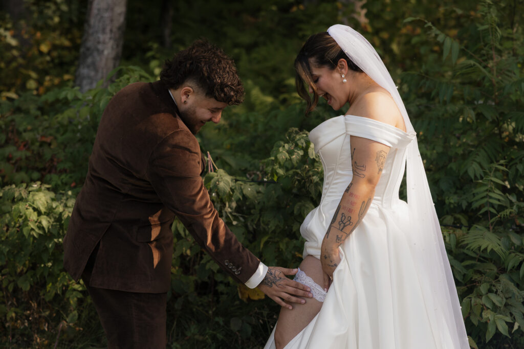 Bride and groom sharing a joyful moment outdoors