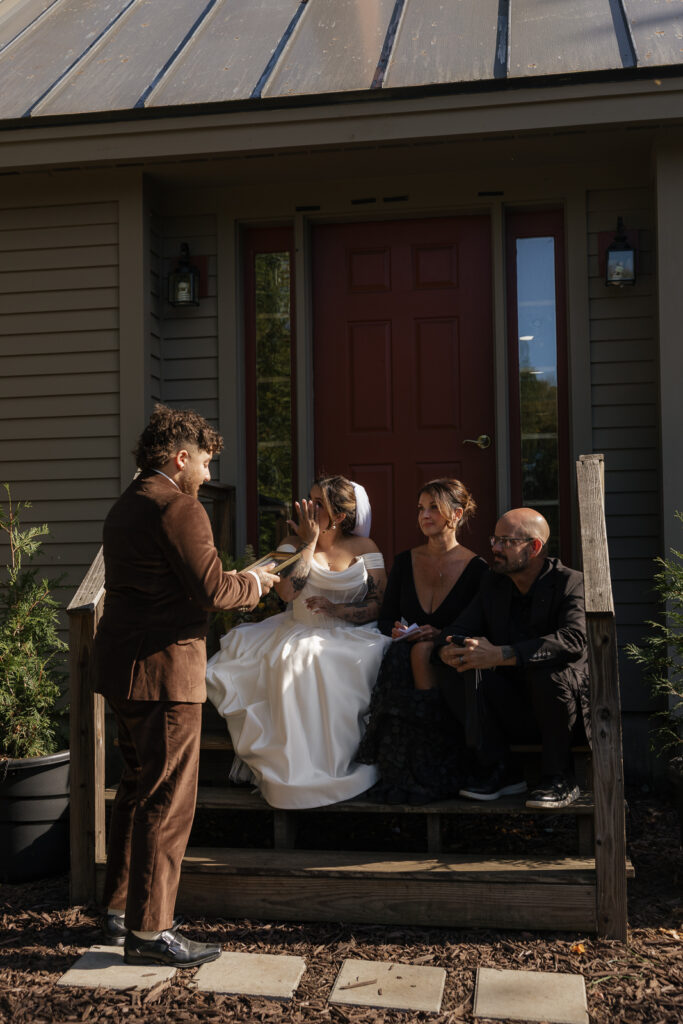 Emotional wedding moment on house steps