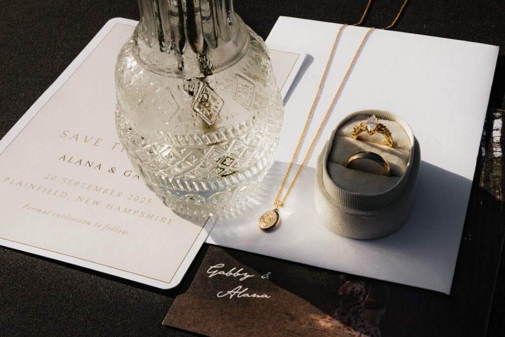Wedding invitation with jewelry and crystal vase