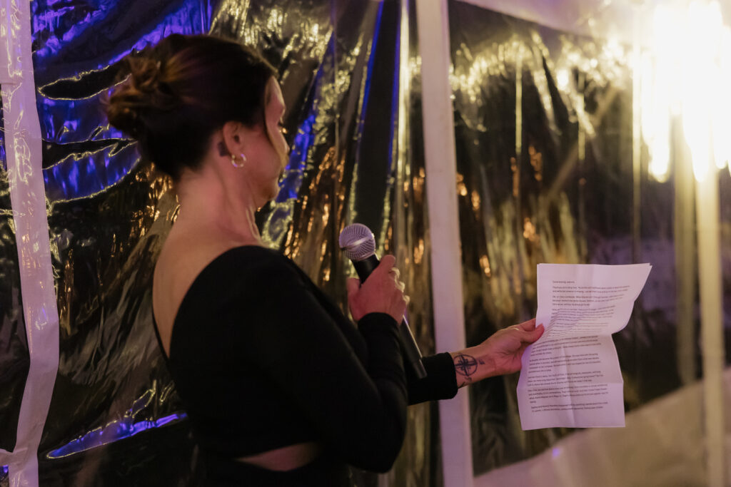 woman holding microphone and speech