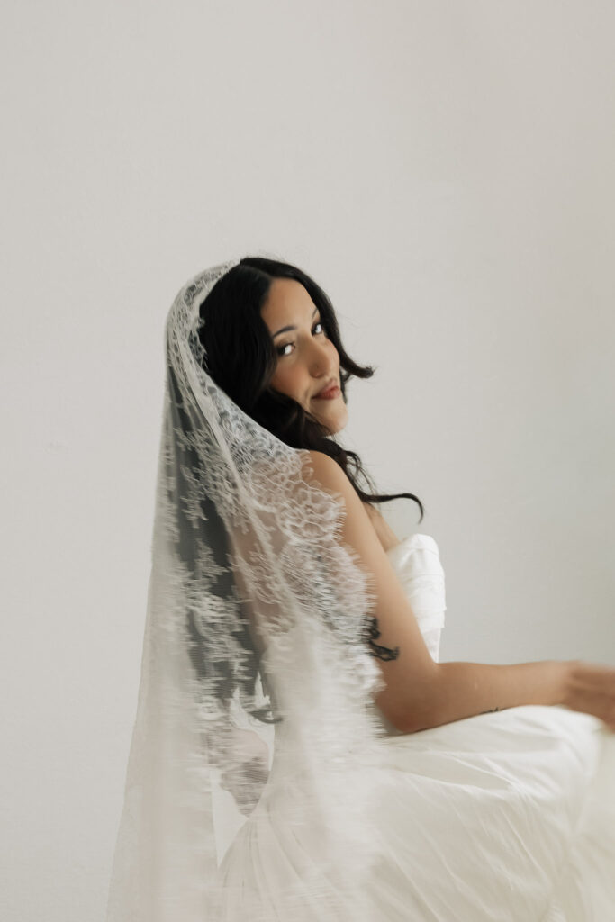 Bride with lace veil and flowing hair