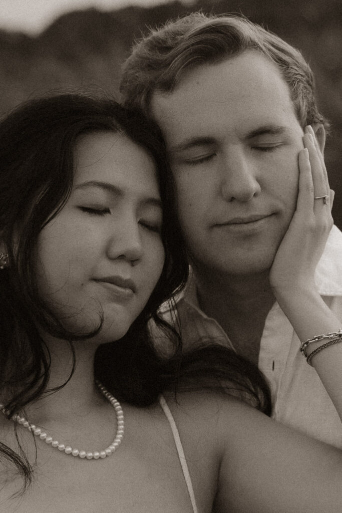 Close-up of a couple embracing with closed eyes
